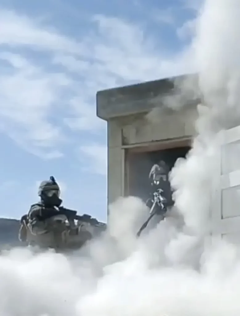 swat team covered in smoke